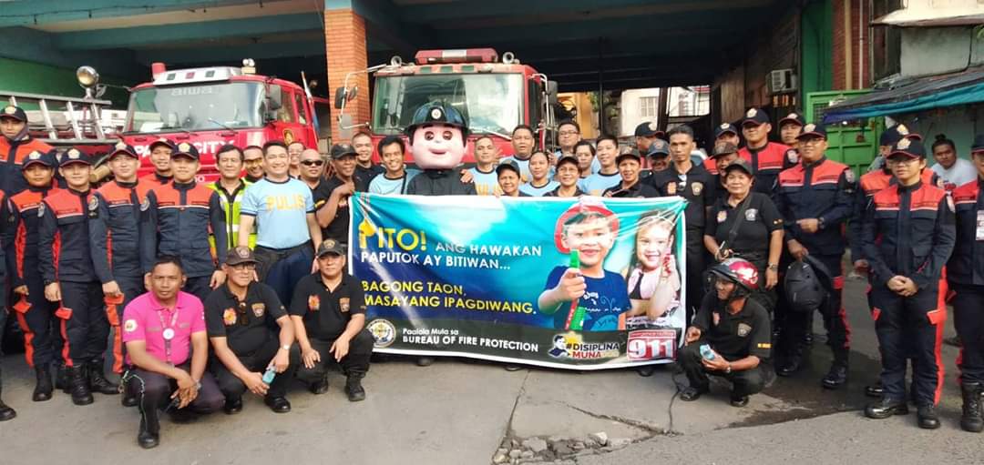 Firefighters, police and a mascot promote the use of "torotot" in Pasay to lessen fire incidents due to fireworks. /Southern Police District