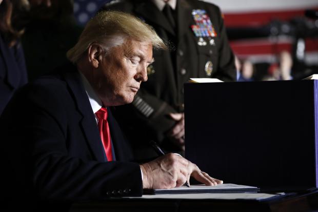 Donald Trump signs National Defense Authorization Act