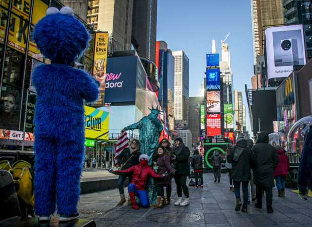  Times Square characters head to Rock Center for the holidays