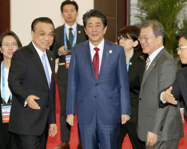 Leaders from China, Japan, and South Korea were meeting Tuesday against the backdrop of increasing threats from North Korea's nuclear and missile programs.
