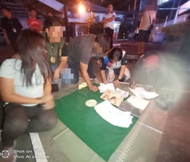 Agents of the Philippine Drug Enforcement Agency conduct an inventory of P3.4 million worth of “shabu”