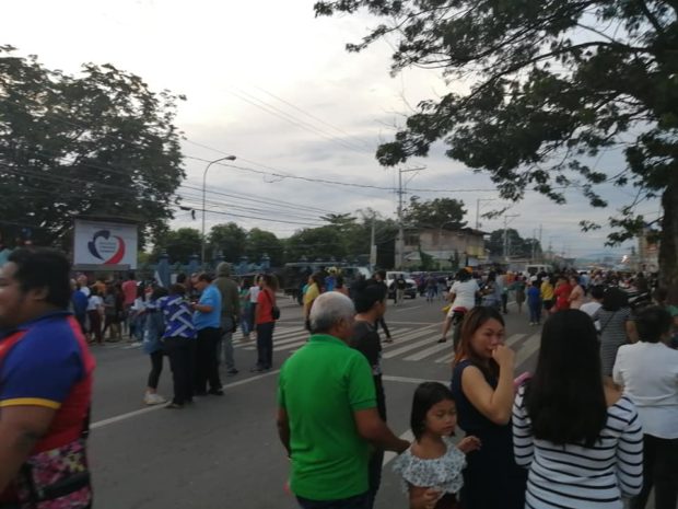 Churchgoers at the Mary Mediatrix Cathedral in Digos City rush toward Rizal Avenue when they feel the shaking of the magnitude 4.3 quake when the dawn mass ended on Sunday. Phivolcs traced the epicenter of the quake 15 kilometers northwest of Malungon, Sarangani province. ORLANDO DINOY