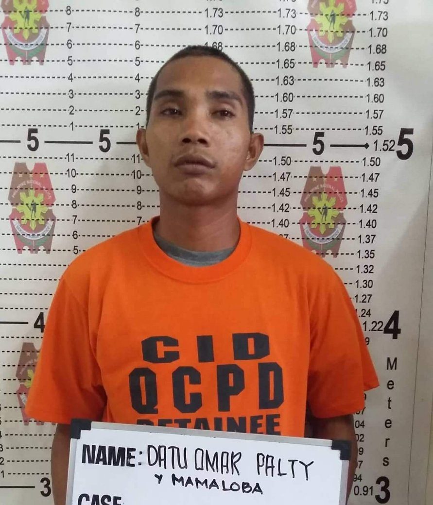 QCPD arrested a suspected member of BIFF for illegal possession of firearms and explosives in Barangay Fairview. /QCPD PIO