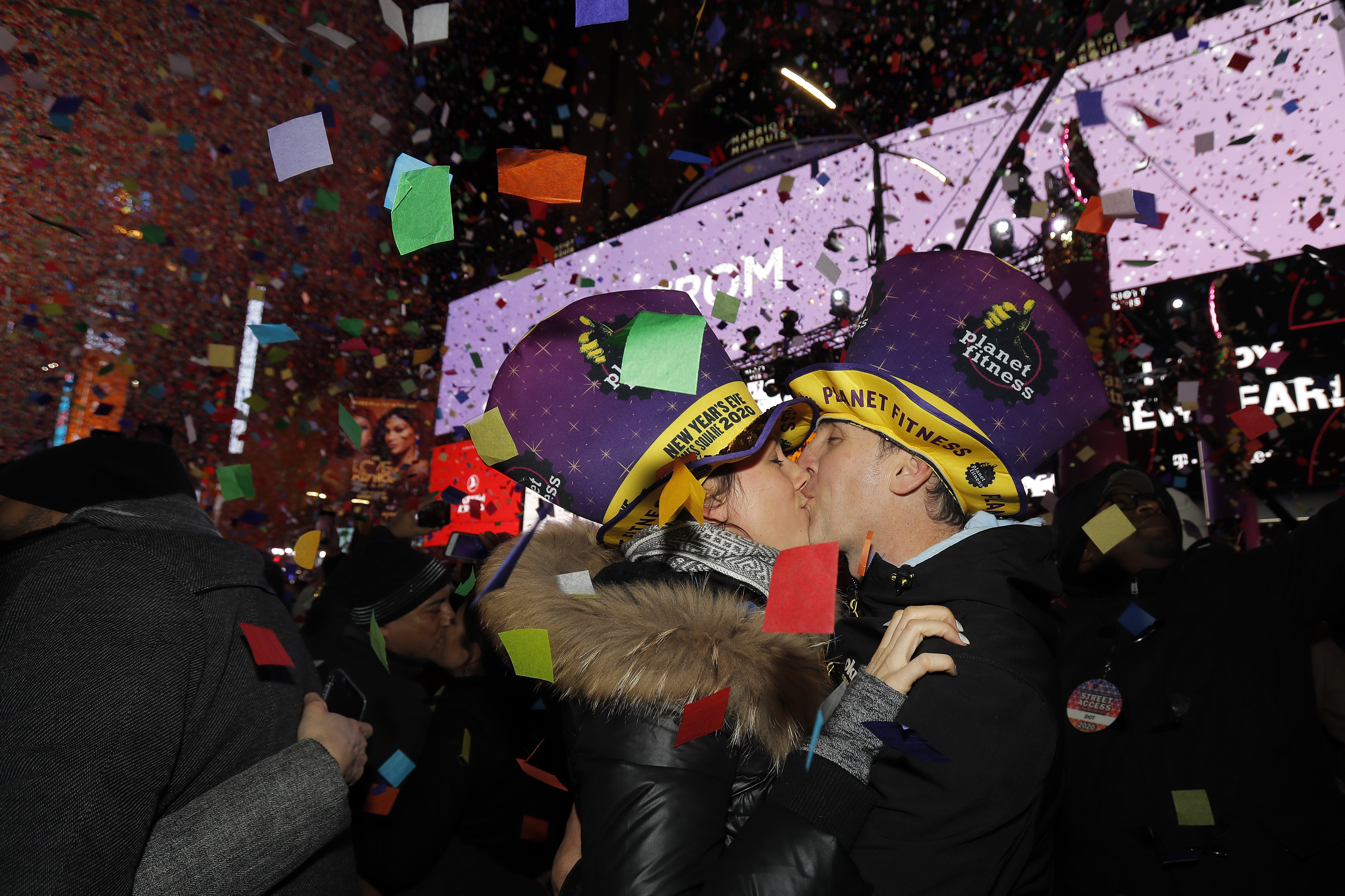 Sandra Desjardins kisses Jean-Charles Goulet both of Montreal, Canada, during a New Year's celebration in New York's Times Square, Wednesday, Jan. 1, 2020. (AP Photo/Adam Hunger)
