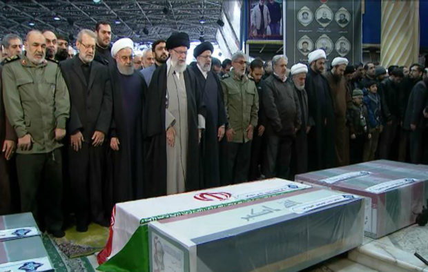 Weeping, Iran supreme leader prays over general slain by US