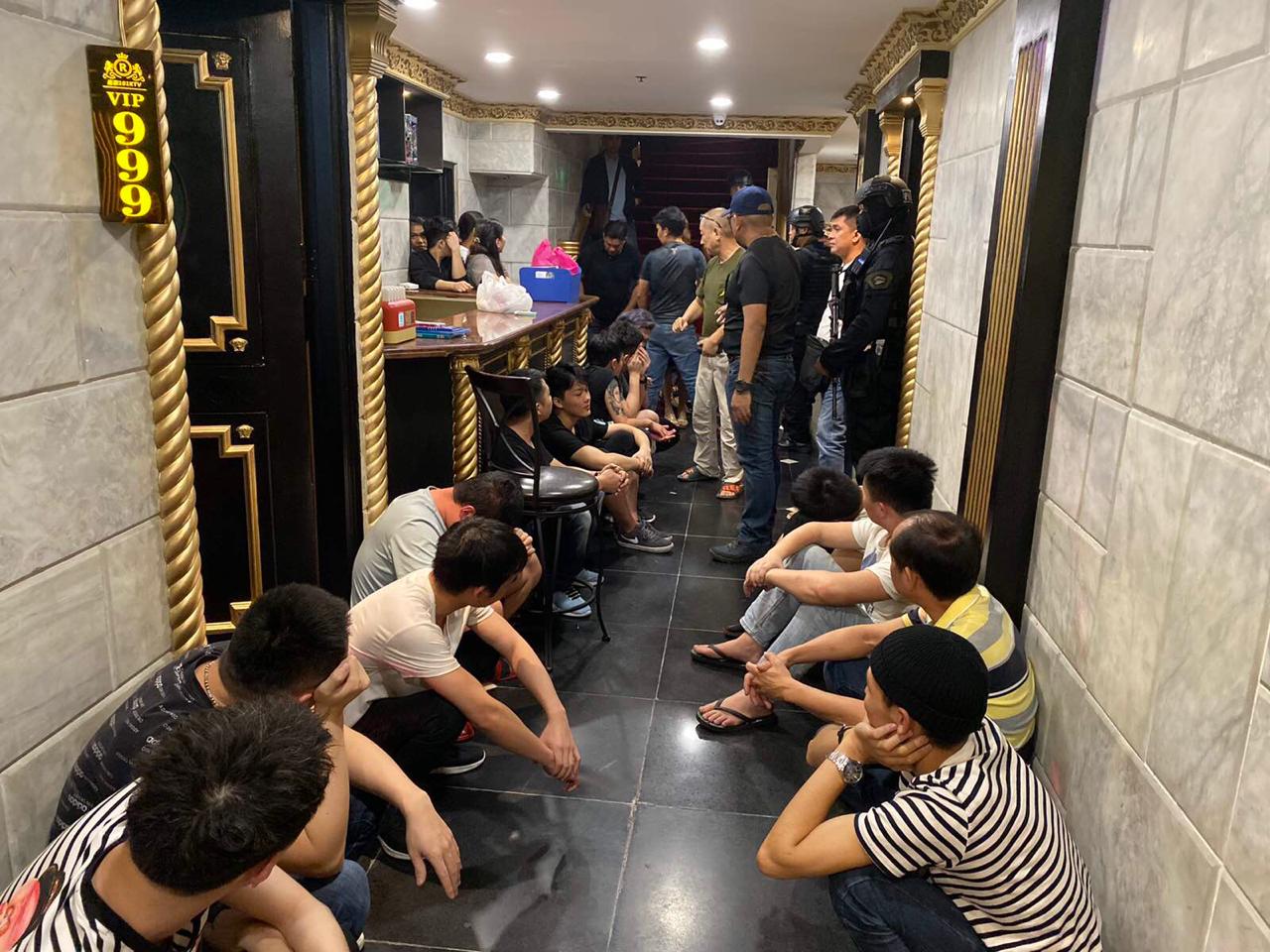 Operatives of the Makati City Police arrest 16 Chinese customers and the owner of an alleged prostitution den in Makati City in a raid launched on Friday, Jan. 10, 2020. (Photo from Makati City Police)