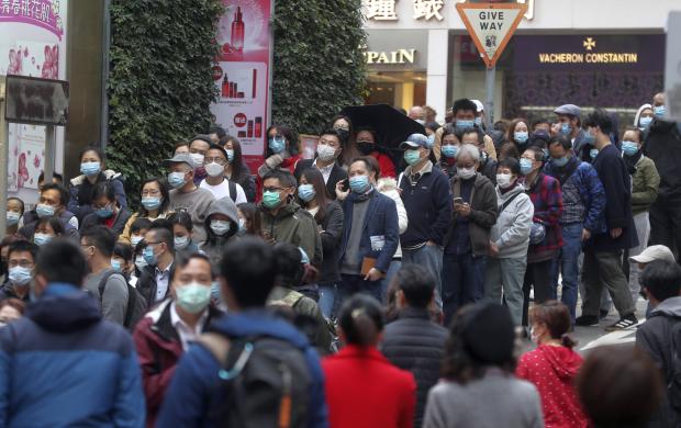 People lineup to buy facemasks in Hong Kong