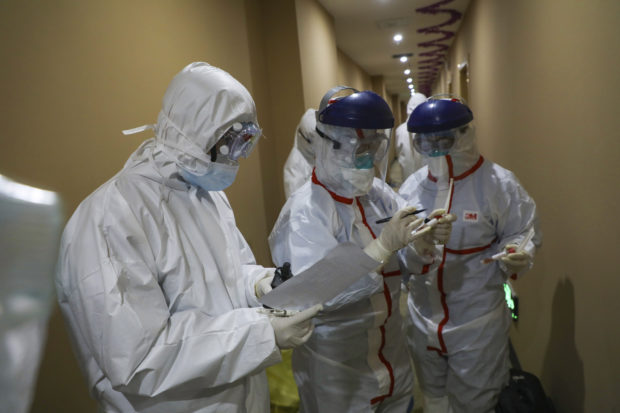 China says 6 health workers died from new coronavirus, 1,716 infected