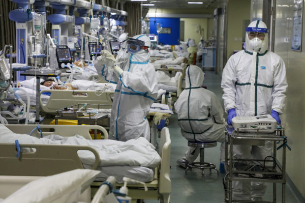 China removes two Hubei leaders as virus crisis deepens