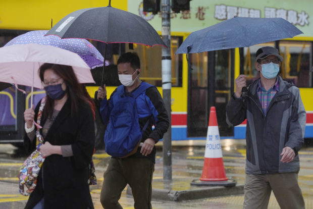  Amid protests and virus, China shuffles Hong Kong officials