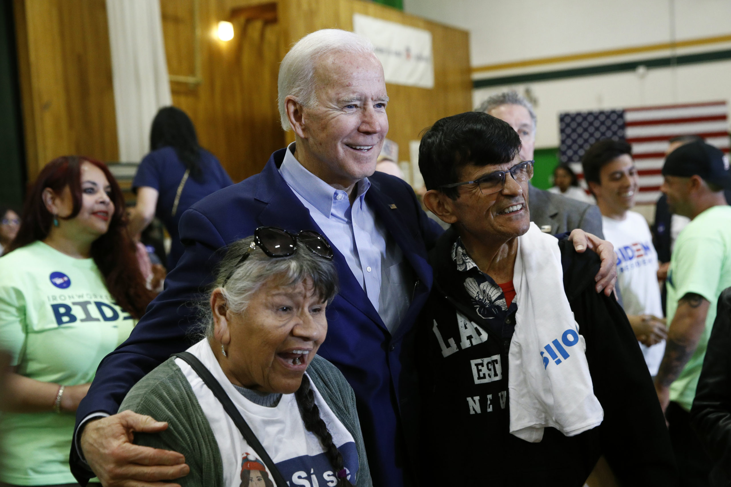 Democratic presidential candidate, former Vice President Joe Biden poses for a photo with attendees after speaking at a campaign event, Saturday, Feb. 15, 2020, at K.O. Knudson Middle School in Las Vegas. (AP Photo/Patrick Semansky)