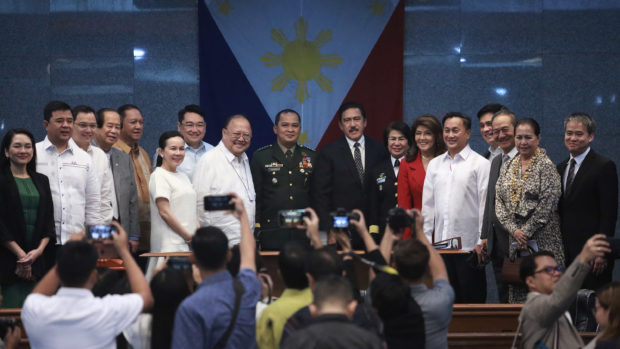 CA gives nod to new AFP chief: Senate President Vicente C. Sotto III (8th from right), poses with newly-installed Armed Forces of the Philippines (AFP) Chief of Staff Gen. Felimon T. Santos Jr. (9th from right) along with the rest of the members of the Commission on Appointments (CA) following his confirmation proceedings Wednesday, February 12, 2020, at the Senate. Standing beside Sotto is the first female Commodore Luzviminda Camacho whose promotion to the post was likewise approved by the Body. (Alex Nueva España/Senate PRIB)