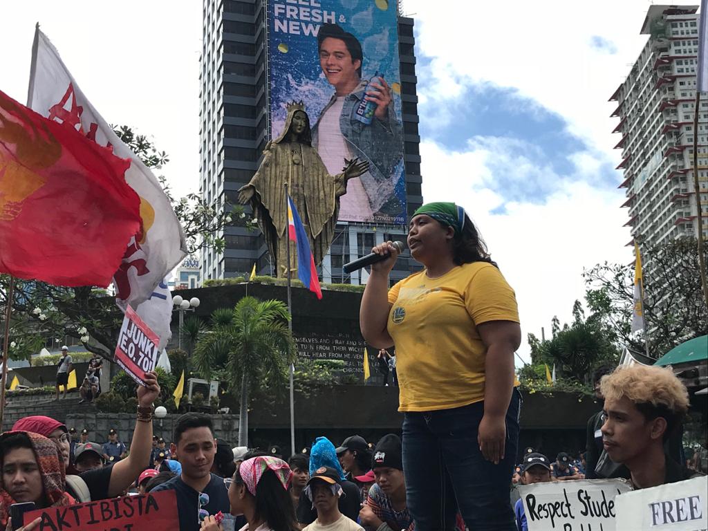 An activist slams policies of the administration of President Rodrigo Duterte during a protest in front of the EDSA Shrine in Quezon City, in time for the commemoration of the 34th anniversary of the EDSA People Power Revolution on Tuesday, Feb. 25, 2020. (Photo by Cathrine Gonzales/INQUIRER.net)