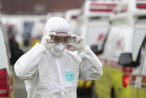 Health worker in protective suit in South Korea