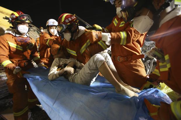  Boy rescued from collapsed hotel in China