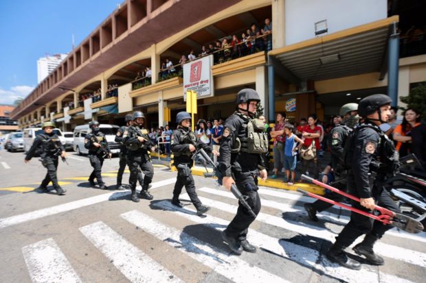 Gunman at San Juan mall also carrying grenades, says witness