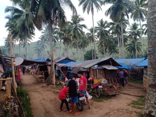HUDDLED. A typical evacuation camp for families displaced by the powerful tremors in Mindanao last year feature cramped makeshift shelters close to each other. This photo taken in Brgy. Upper Bala, Magsaysay, Davao del Sur. Orlando B. Dinoy, Inquirer Mindanao
