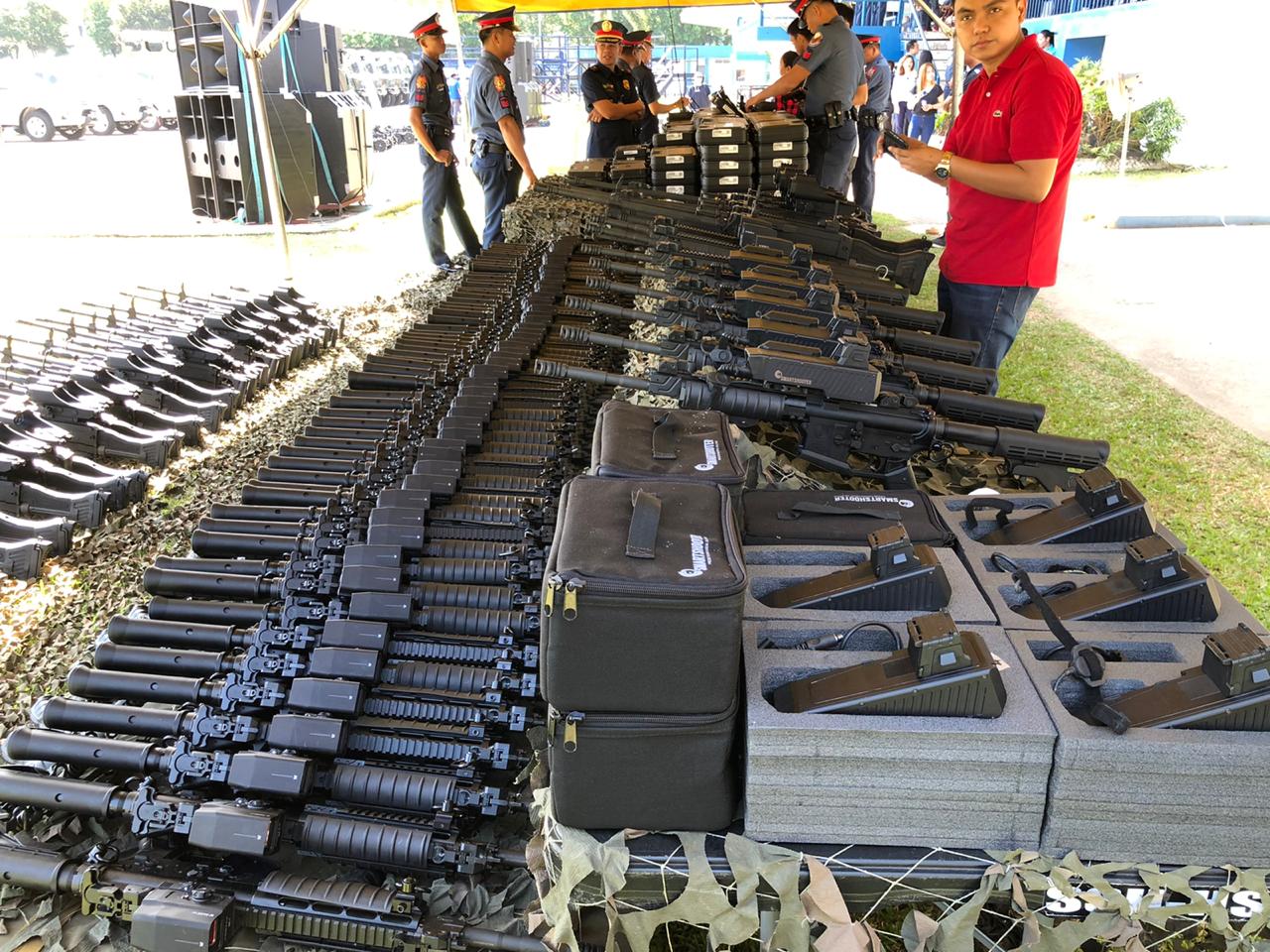 Police equipment, including choppers, troop carriers, bomb equipment, and firearms were presented and blessed at Camp Crame 9