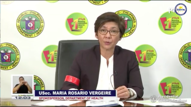 Health Undersecretary Maria Rosario Vergeire wears a red band on her arm which signifies her support for medical workers who helped in fighting the spread of COVID-19 in the Philippines. /Screenshot from PTV live briefing of Laging Handa