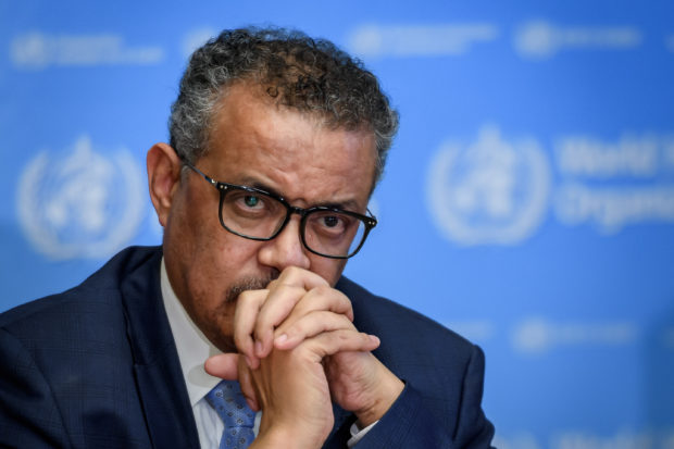 World Health Organization (WHO) Director-General Tedros Adhanom Ghebreyesus attends a daily press briefing on the new coronavirus dubbed COVID-19, at the WHO headquaters on March 2, 2020 in Geneva. - The World Health Organization said that the number of new coronavirus cases registered in the past day in China was far lower than in the rest of the world. (Photo by FABRICE COFFRINI / AFP)