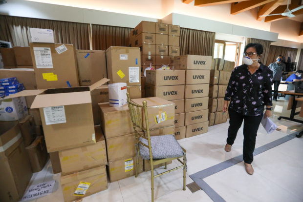 Vice President Leni Robredo oversees the preparation of personal protective equipment (PPE) sets that will be delivered to another batch of hospitals on Tuesday, March 24, 2020. PHOTO FROM OVP
