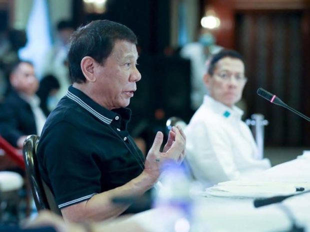 Rodrigo Duterte and Francisco Duque III at a Malacañang briefing. STORY: Duterte key to fewer COVID cases in PH vs rest of SE Asia – Duque