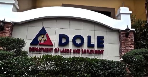 DOLE sign at the building facade. STORY: DOLE to offer over 73,000 jobs on Labor Day
