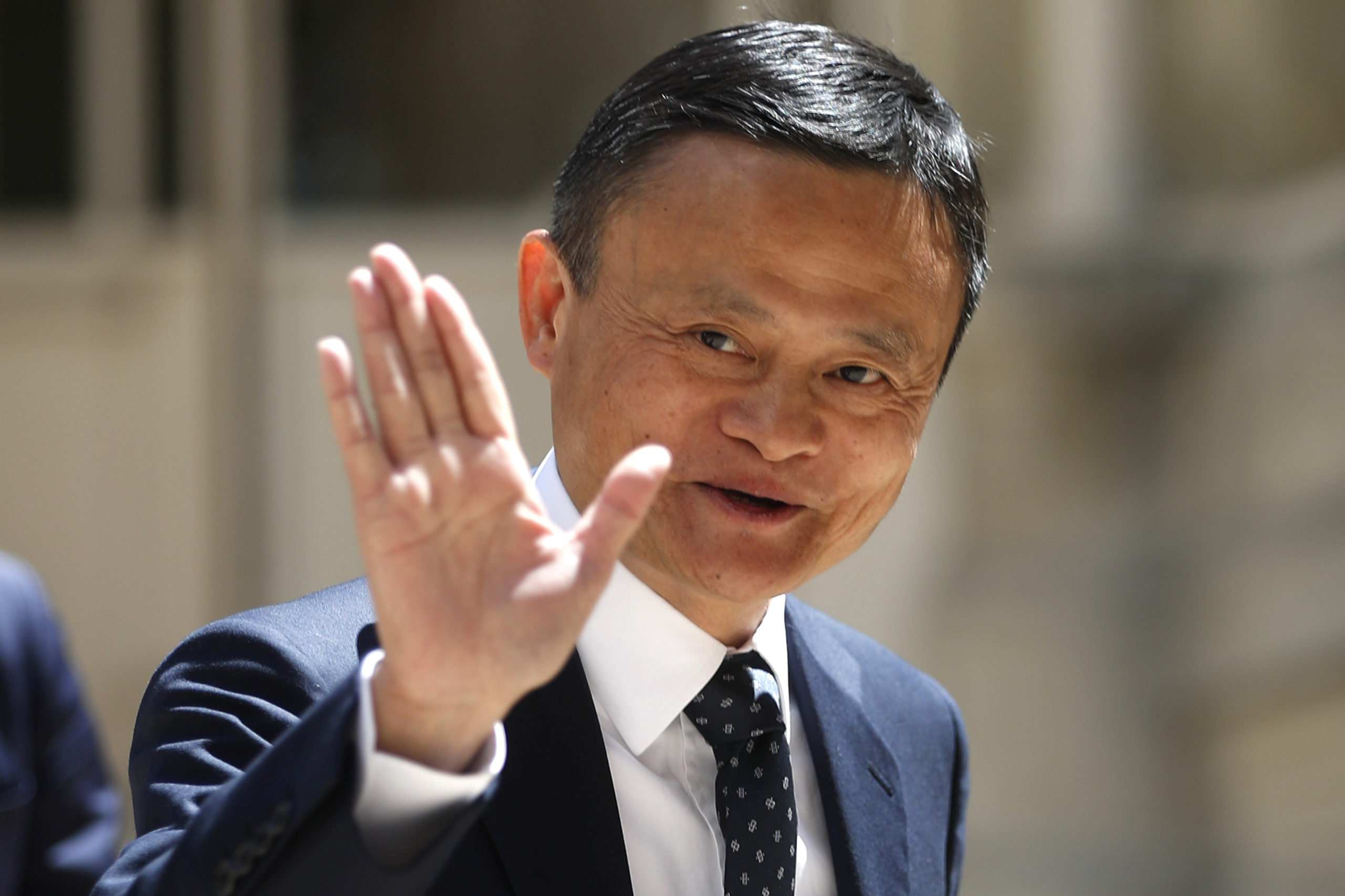 FILE - In this May 15, 2019, file photo, founder of Alibaba group Jack Ma arrives for the Tech for Good summit in Paris. As the coronavirus spread, the world’s richest communist dug into his deep pockets. Jack Ma, founder of e-commerce giant Alibaba Group and a member of the ruling Communist Party, helped to pay for 1,000 ventilators delivered to New York in April. Ma's foundation also is giving ventilators, masks and other supplies in Africa, Latin America and Asia. (AP Photo/Thibault Camus, File)