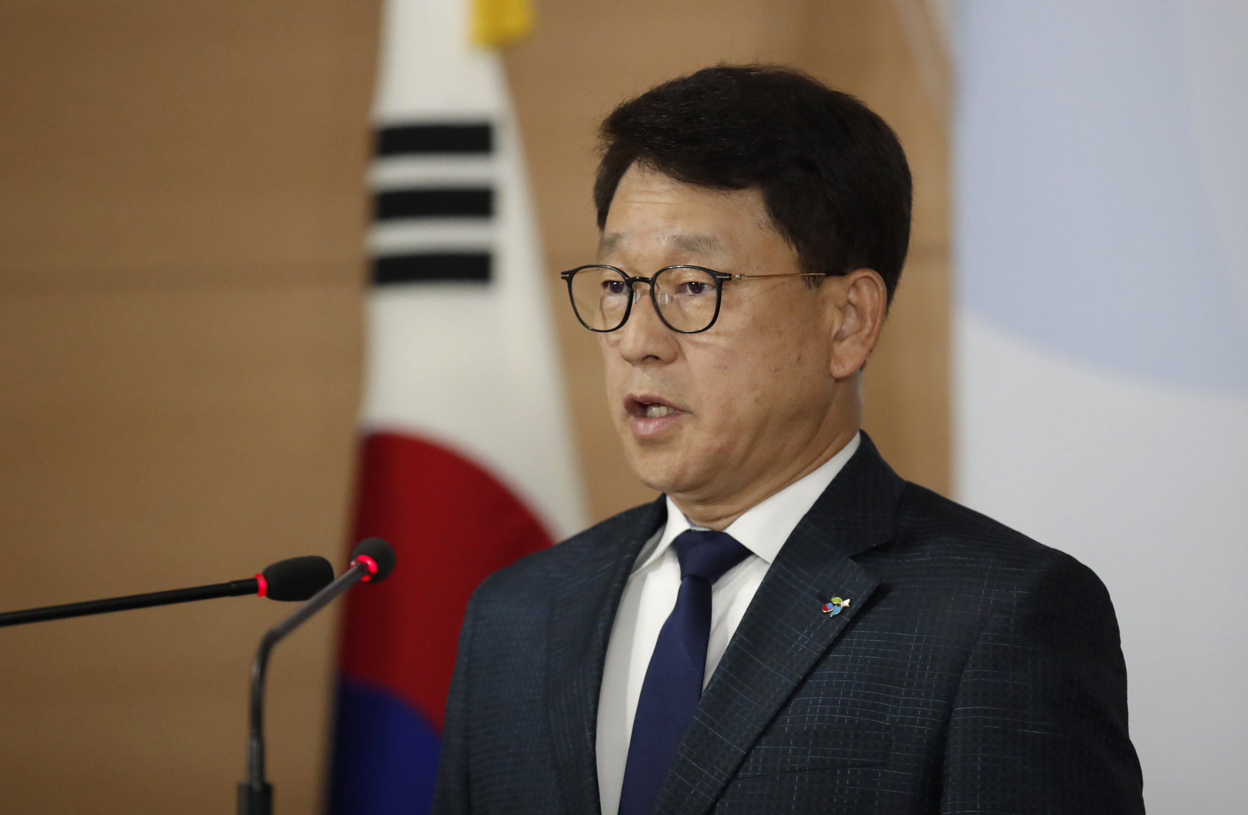 South Korea's Unification Ministry's spokesman Yoh Sang-key, speaks during a briefing at the government complex in Seoul, South Korea, Wednesday, June 10, 2020. South Korea’s government on Wednesday said it will sue two activist groups that have sent anti-Pyongyang leaflets and plastic bottles filled with rice to the North for allegedly creating tensions between the rivals. (AP Photo/Lee Jin-man)