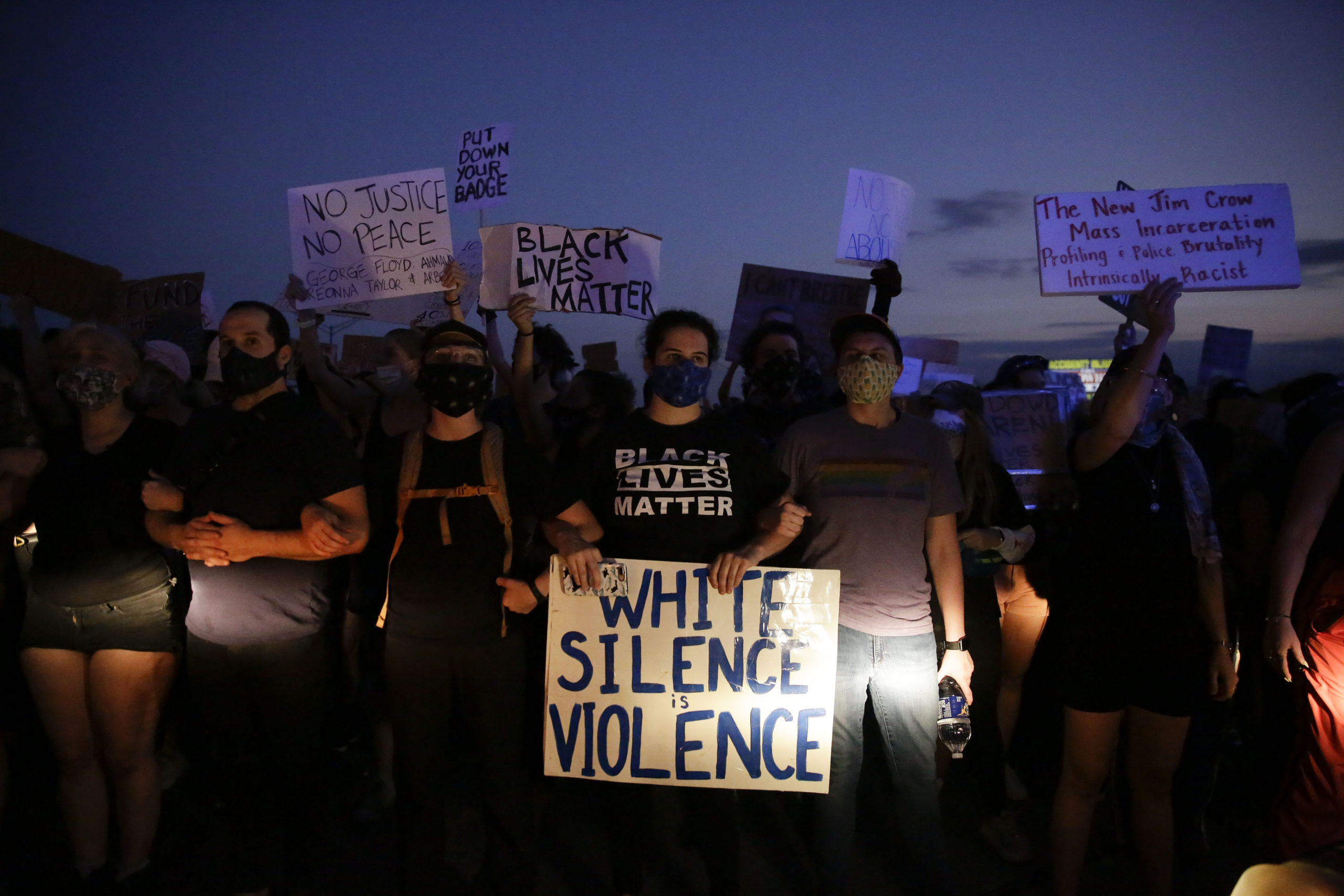 Protesters block traffic on the highway during protests Saturday, June 13, 2020, near the Atlanta Wendy's where Rayshard Brooks was shot and killed by police Friday evening following a struggle in the restaurant's drive-thru line in Atlanta. (AP Photo/Brynn Anderson)
