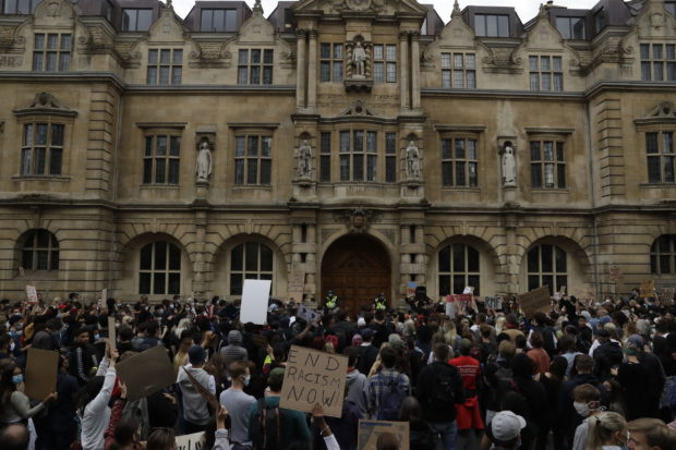 Protesters rally at Oriel College of the University of Oxford