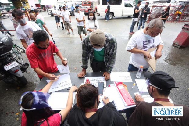 Taguig City local government distributes sidecar protective materials