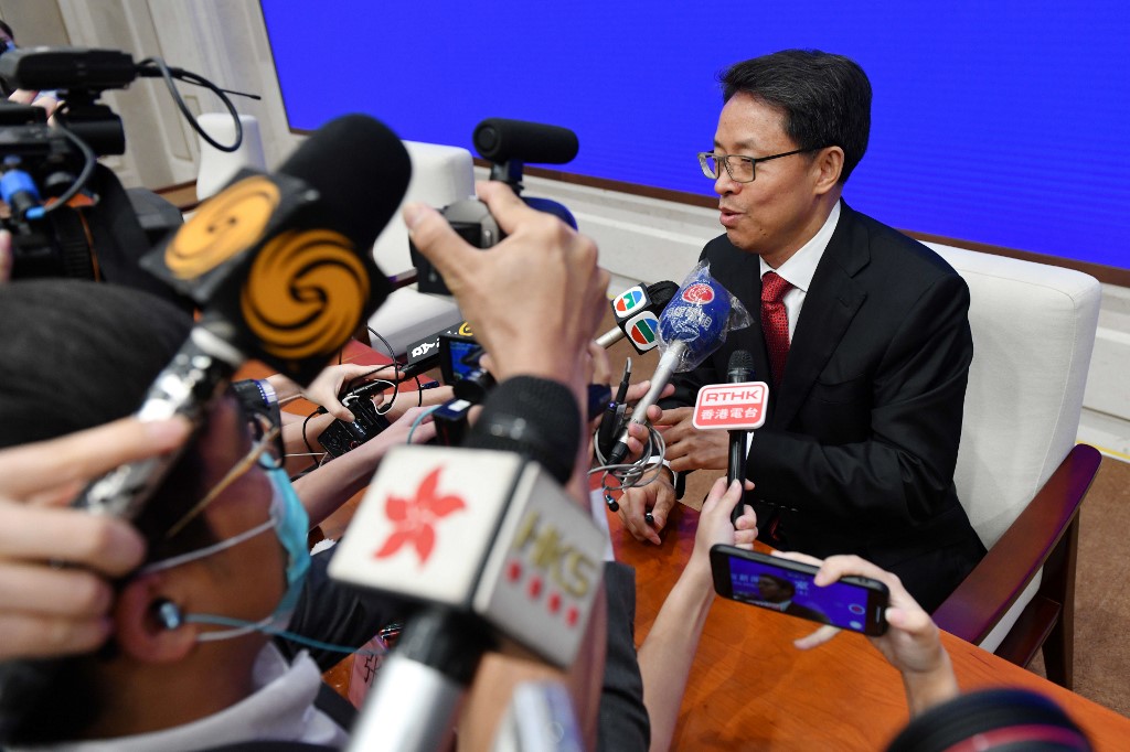 Zhang Xiaoming, executive deputy director of the Hong Kong and Macao Affairs office of the State Council, speaks to journalists at the end of a press conference about the new Hong Kong national security law in Beijing on July 1, 2020. - Hong Kong marks the 23rd anniversary of its handover to China on July 1 under the glare of a new national security law imposed by Beijing, with protests banned and the city's cherished freedoms looking increasingly fragile. (Photo by GREG BAKER / AFP)