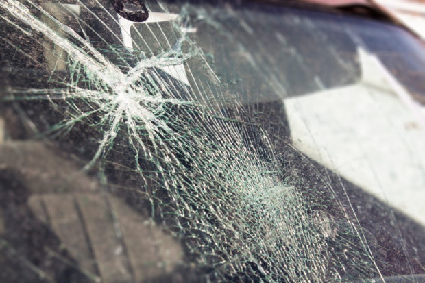 Stock photo of brokenn car windshield. STORY: Higher third-party liability insurance sought
