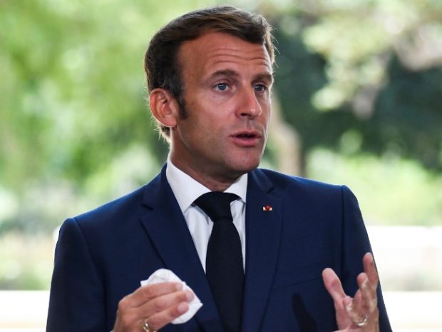 Macron slapped by man during trip to southeast France; 2 detained
