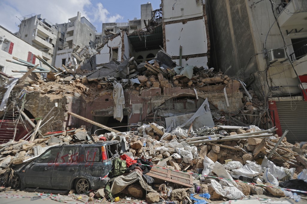 A picture taken on August 11, 2020, shows a view of destroyed traditional Lebanese houses due to the Beirut port explosion, in the devastated Gemmayzeh neighbourhood across from the harbour. (Photo by JOSEPH EID / AFP)
