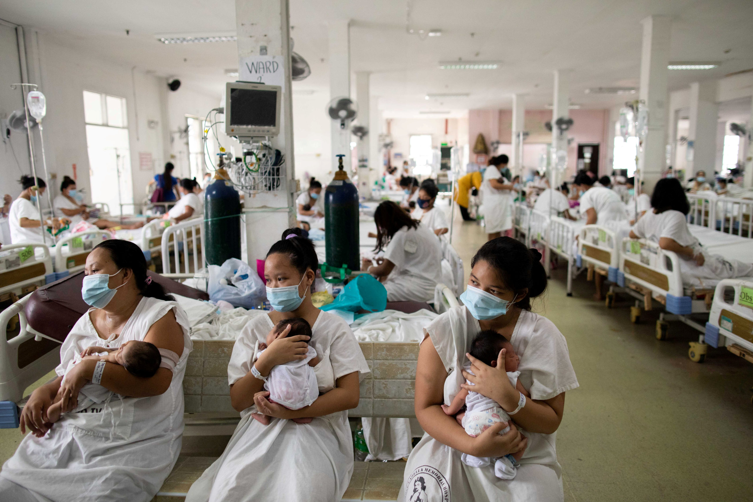 File photo shows mothers cuddling their babies inside the maternity ward of the government-run Dr. Jose Fabella Memorial Hospital, amid the coronavirus disease (COVID-19) outbreak, in Manila in 2020.  (REUTERS)