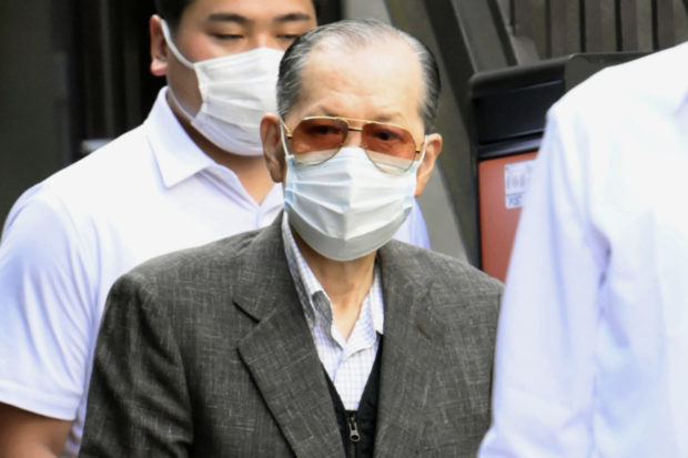 Japan police arrest fraud suspect linked to ex-PM's event