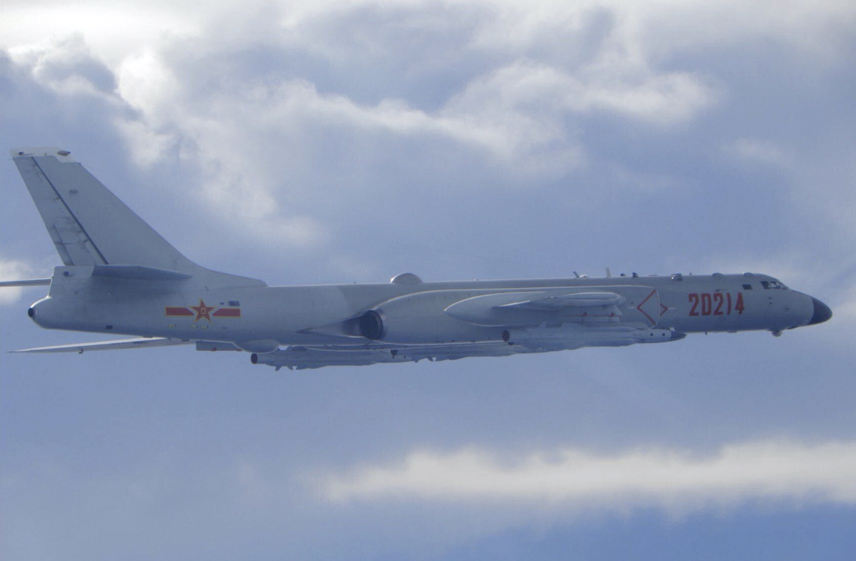 In this photo released by the Taiwan Ministry of National Defense, a Chinese People's Liberation Army H-6 bomber is seen flying near the Taiwan air defense identification zone, ADIZ, near Taiwan on Friday, Sept. 18, 2020. The second high-level U.S. envoy to visit Taiwan in two months began a day of closed-door meetings Friday as China conducted military drills near the Taiwan Strait after threatening retaliation. (Taiwan Ministry of National Defense via AP)