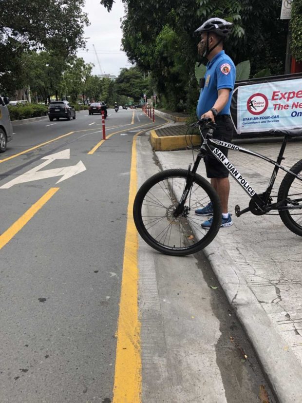 Police bike patrollers with body cameras activated to monitor health protocol violators. /San Juan PIO