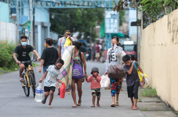 GETTING READY Residents from Legazpi City, Albay province prepare and evacuate before Typhoon Rolly enters the Bicol region. Photos taken on October 31, 2020, Saturday. MARK ALVIC ESPLANA / INQURER SOUTHERN LUZON