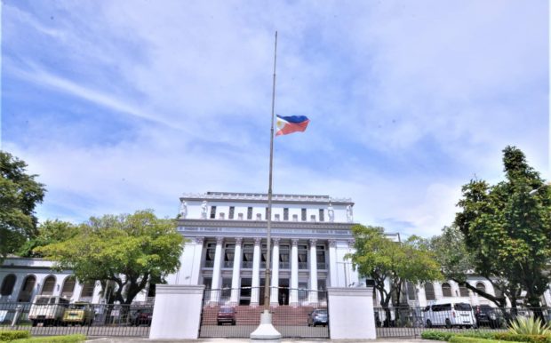 Flag flies at half staff in front of the negros Occidental Capitol 