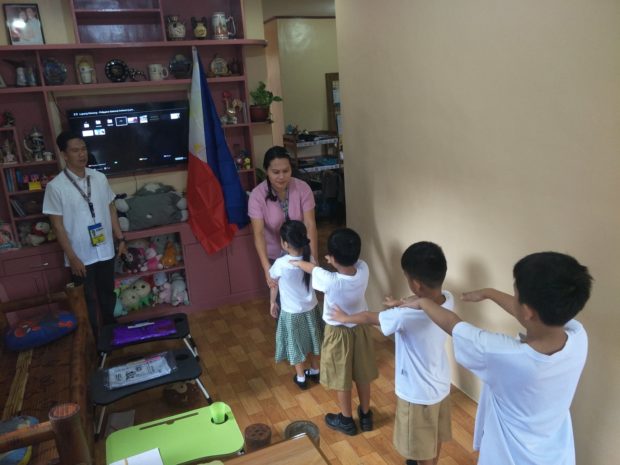 Teacher-parents conduct flag ceremony with kids at home in GenSan