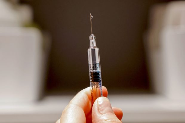 Palace cites eased anti-COVID vaccination requirements to again coax unvaccinated