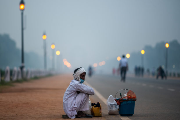 Delhi battling dual crises of pollution and coronavirus