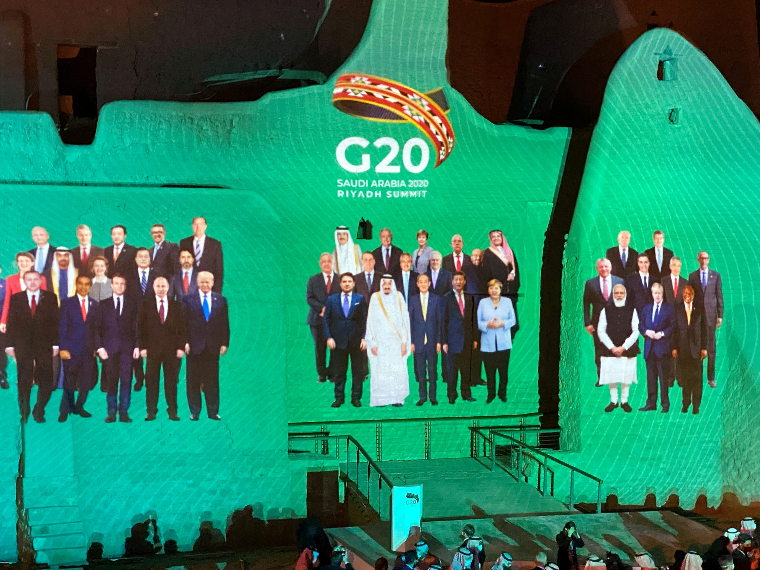 "Family Photo" for annual G20 Summit World Leaders is projected onto Salwa Palace in At-Turaif, one of Saudi Arabia's UNESCO World Heritage sites, in Diriyah, Saudi Arabia, November 20, 2020. REUTERS/Nael Shyoukhi