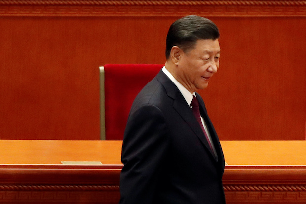 Chinese President Xi Jinping arrives for a meeting in Beijing