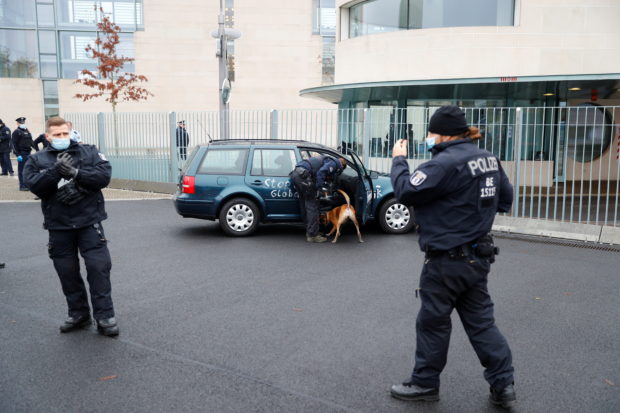 Car crashes into gate of Merkel's office