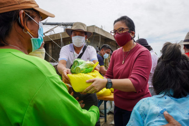 LOOK: Robredo visits Rolly-battered Catanduanes, gives aid