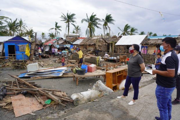 LOOK: Robredo checks, brings relief to Rolly-hit Camarines Sur